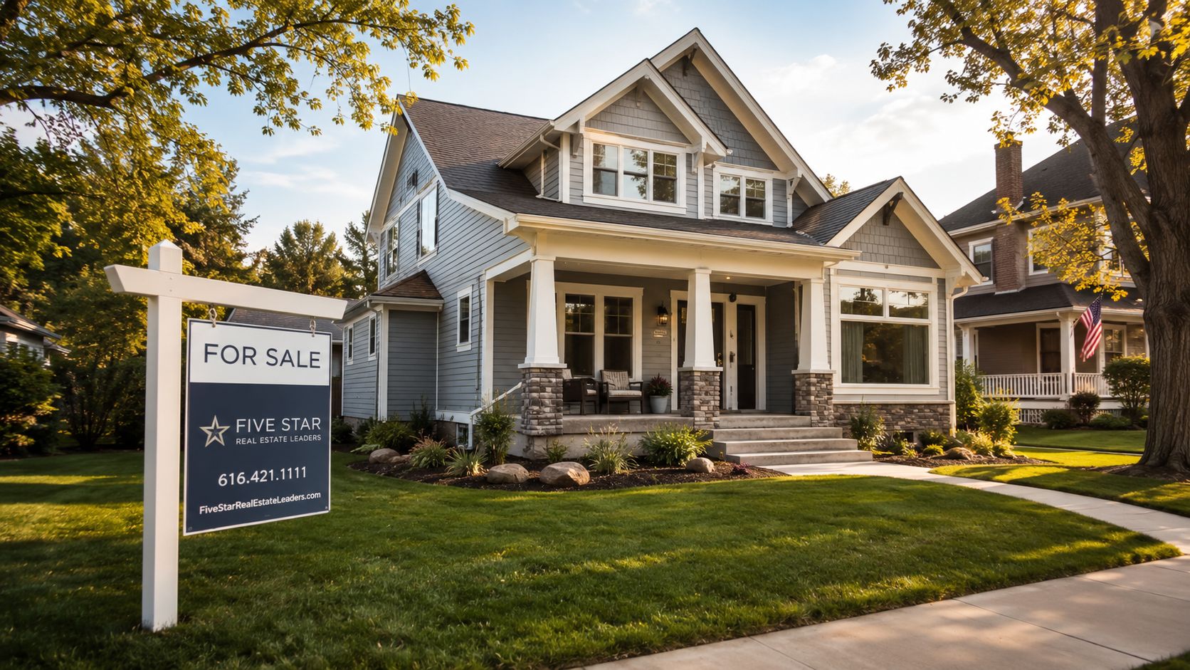 A charming blue craftsman style house for sale with a Five Star Real Estate sign in front.